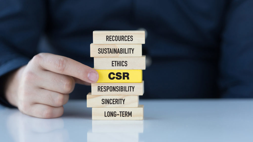 Corporate Social Responsibility Concept with Related Keywords on Wooden Blocks