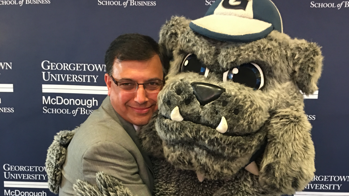 Dean Prashant Malaviya with the Georgetown University mascot