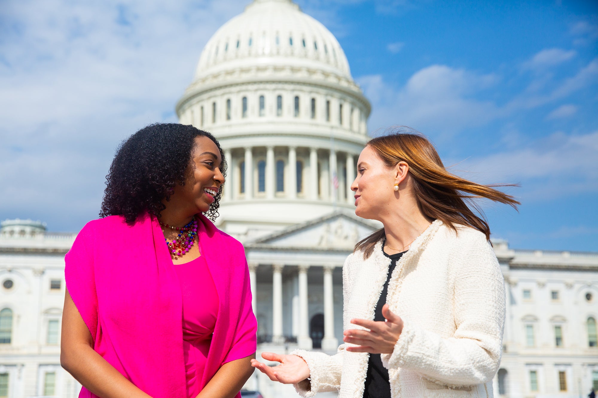 2 IBP students in front of capitol hill