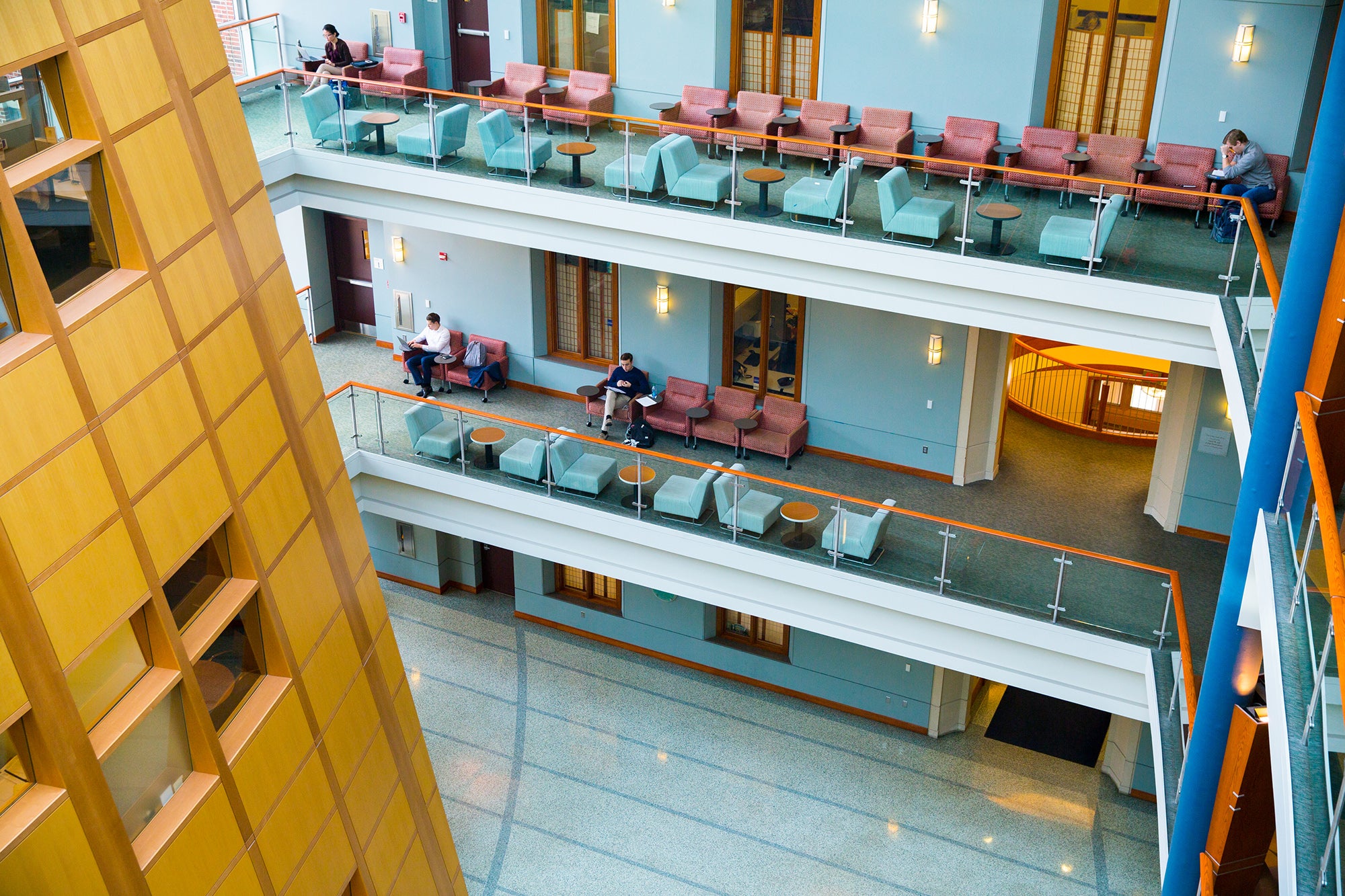 Inside Hariri Building Atrium looking down on students working