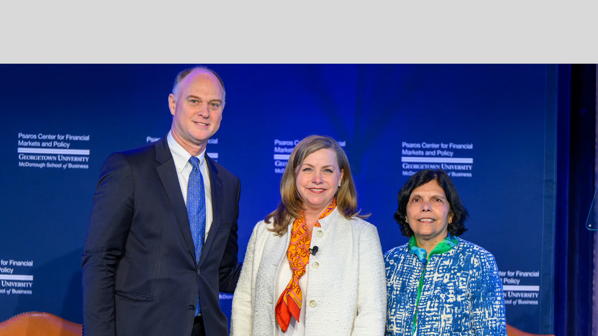 Federal Reserve Governor Michelle Bowman with David Vandivier, executive director of the Psaros Center, and Reena Aggarwal, Robert E. McDonough Professor of Finance and founding director of the Psaros Center.