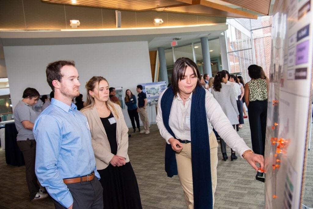 Brittany Gallahan (MS-ESM‘24) offered an interactive presentation to Christian Roberts, an associate at the Conservation Innovation Fund, and Sydney VandeMeulebroecke (MS-ESM‘24). 