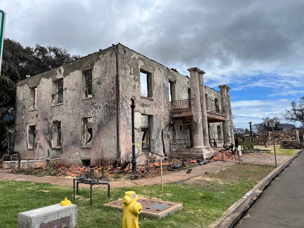 A building destroyed by the wildfires in Lahaina