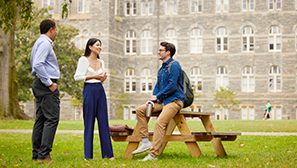 Students discussing topics outside on the georgetown campus