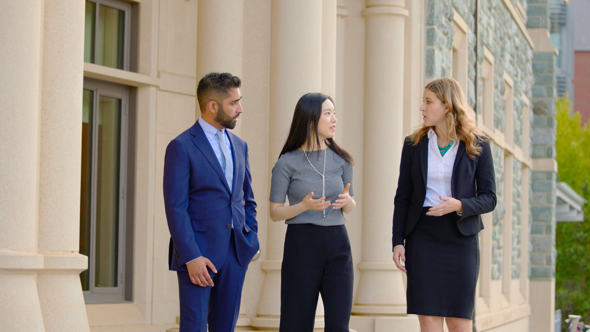 MBA students in front of the Rafik B. Hariri Building at Georgetown's McDonough School of Business