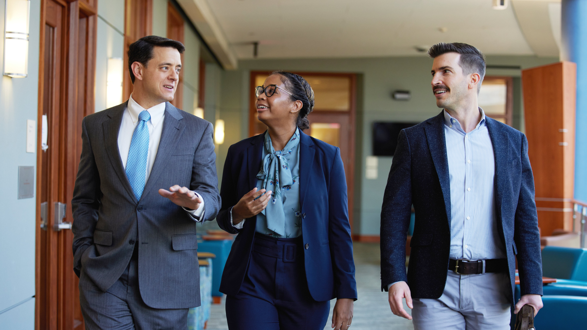 Executive MBA students walking through the Rafik B. Hariri Building