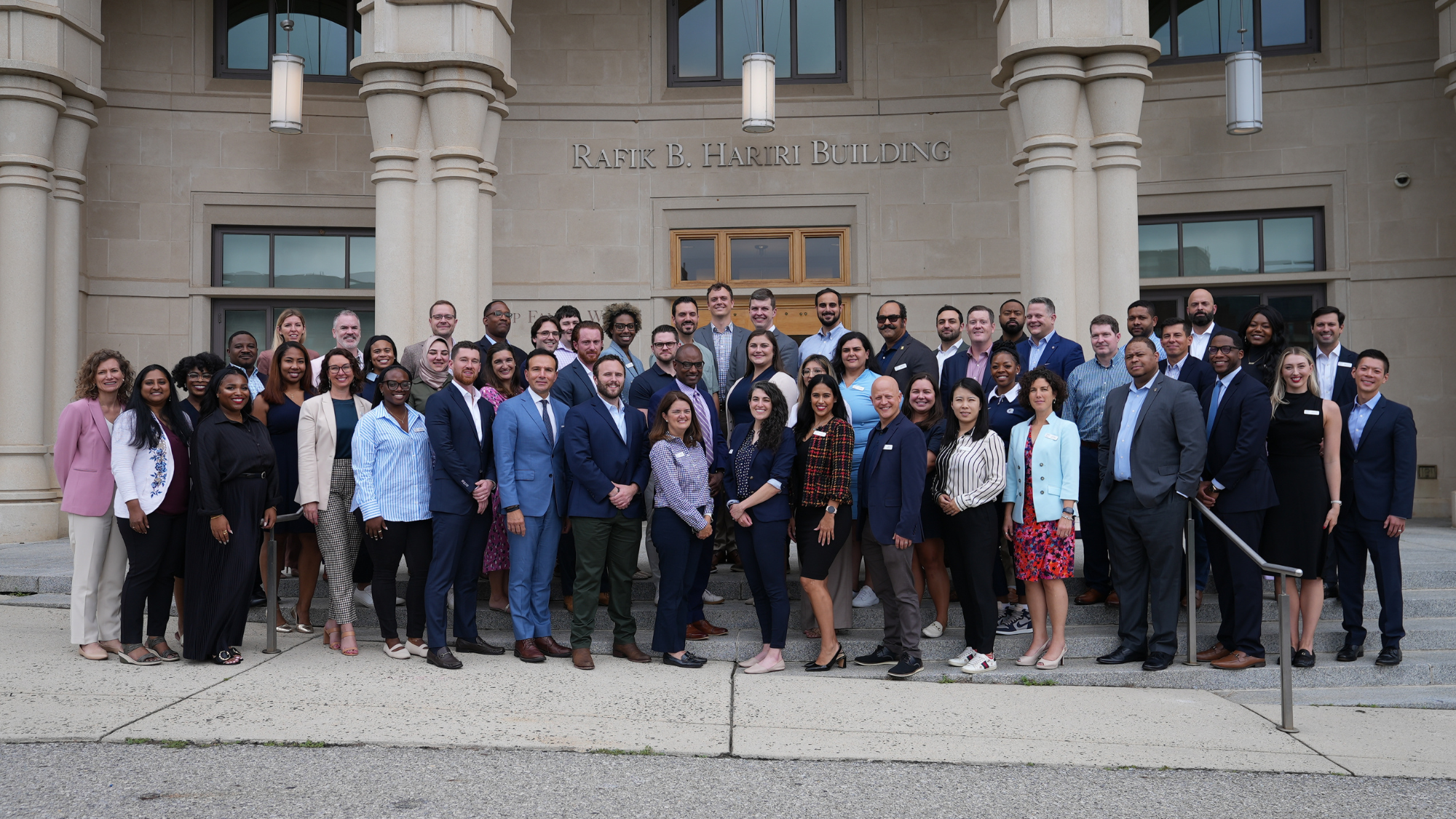 Group photo of the Executive MBA incoming class in front of the RafikB. Hariri Building at Georgetown McDonough