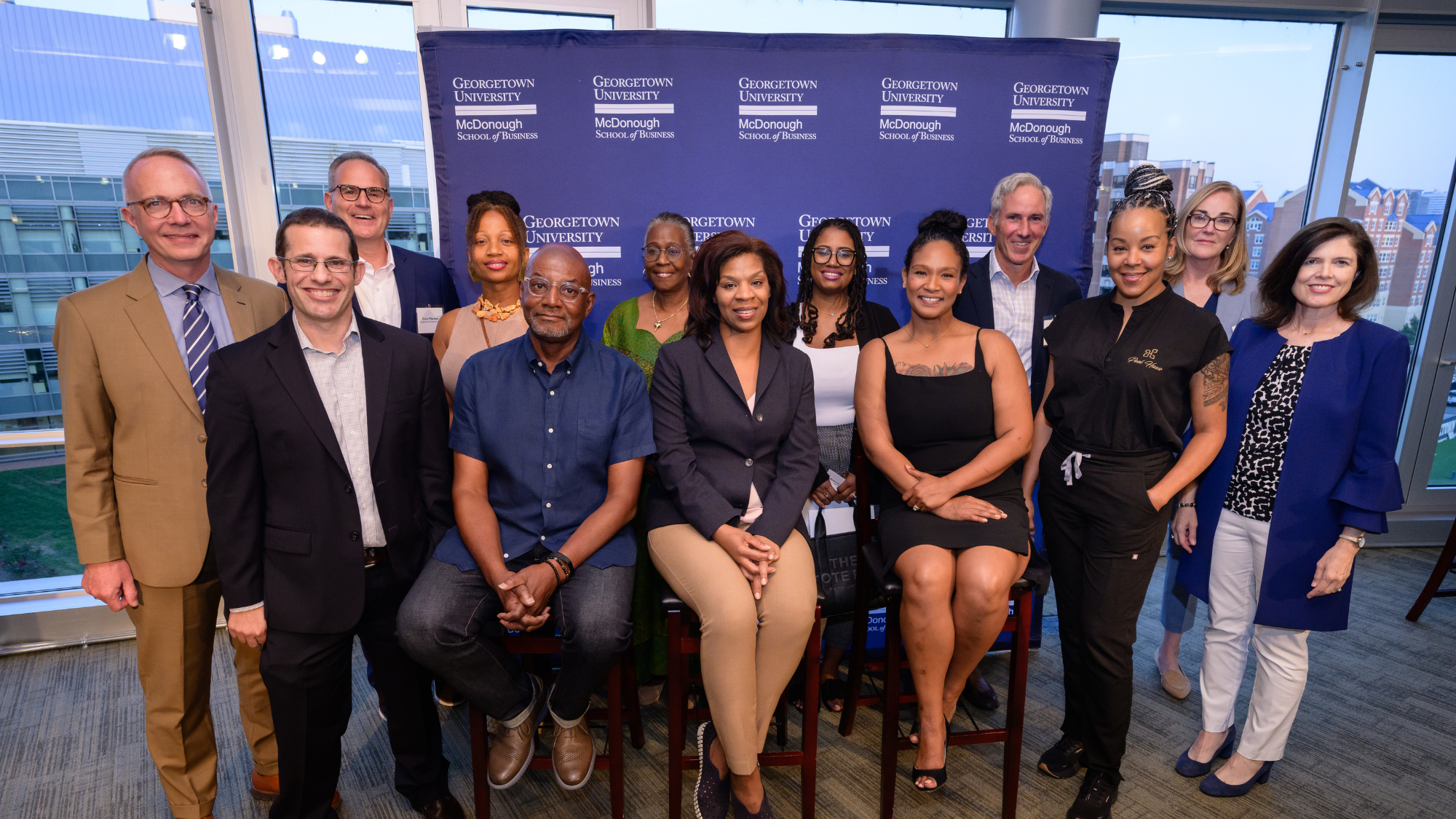 The inaugural cohort of Small Business Corps small businesses at the launch celebration in the Rafik B. Hariri Building at Georgetown