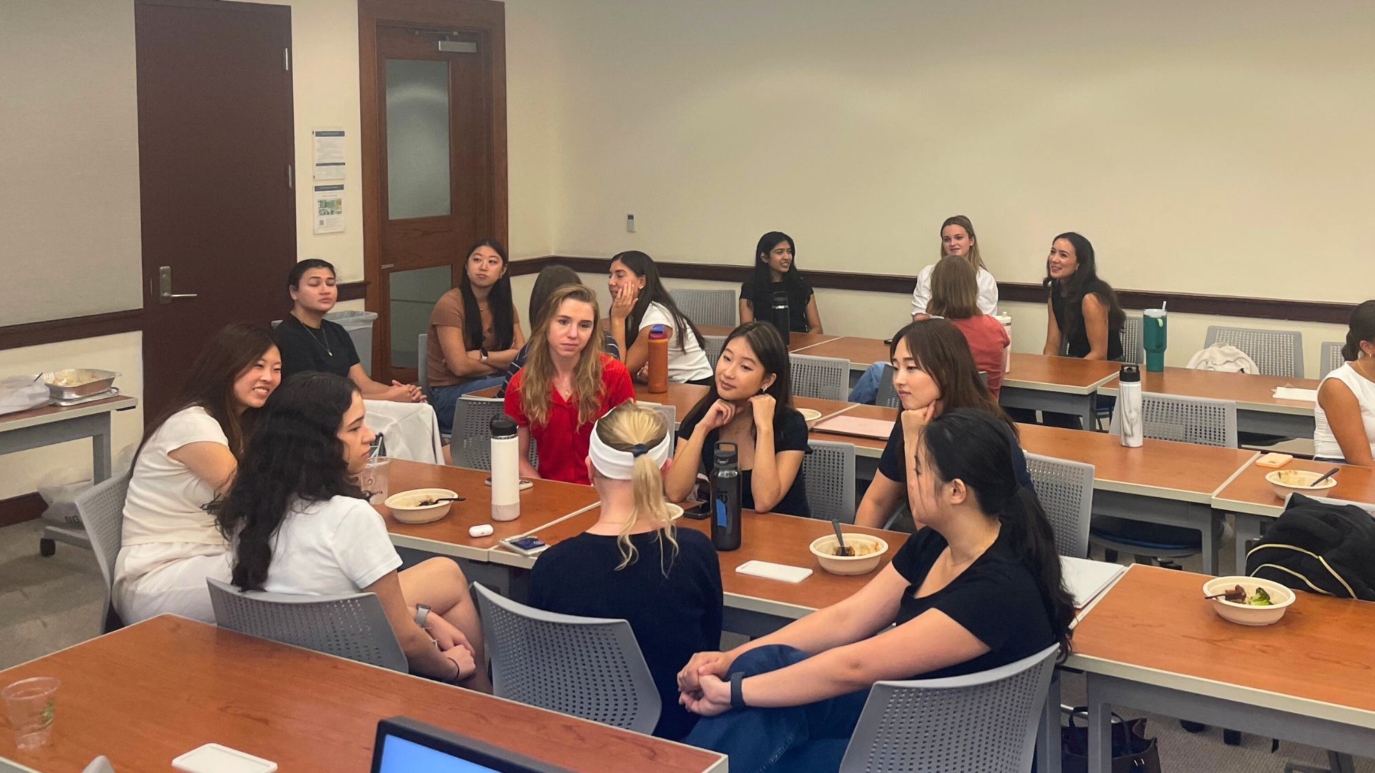 Inaugural cohort of Kosoy Women in Business students meet in a classroom during the first weeks of the program