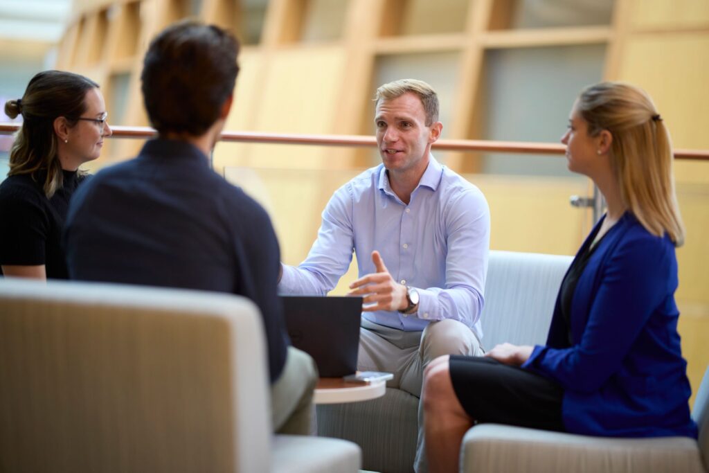 students talking in Georgetown business building