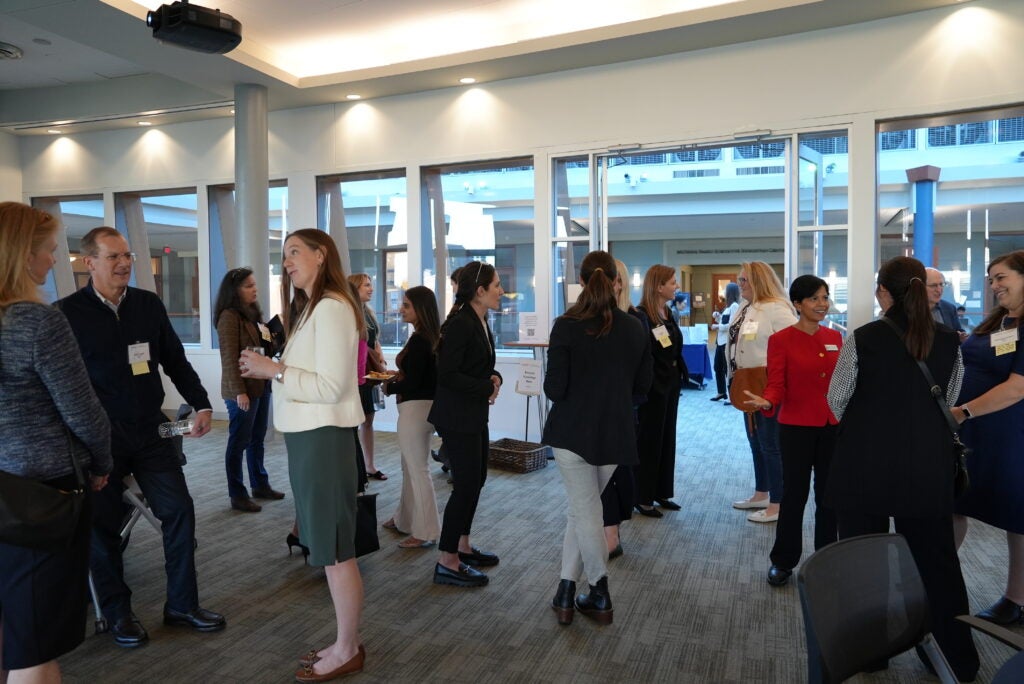 Members of EmpowerHER mingle during the first event in D.C.