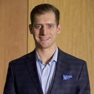brian linville a smiling professional man in a nice suit