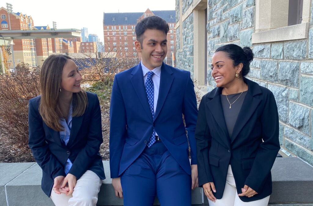 Undergraduate students in front of Hariri Building