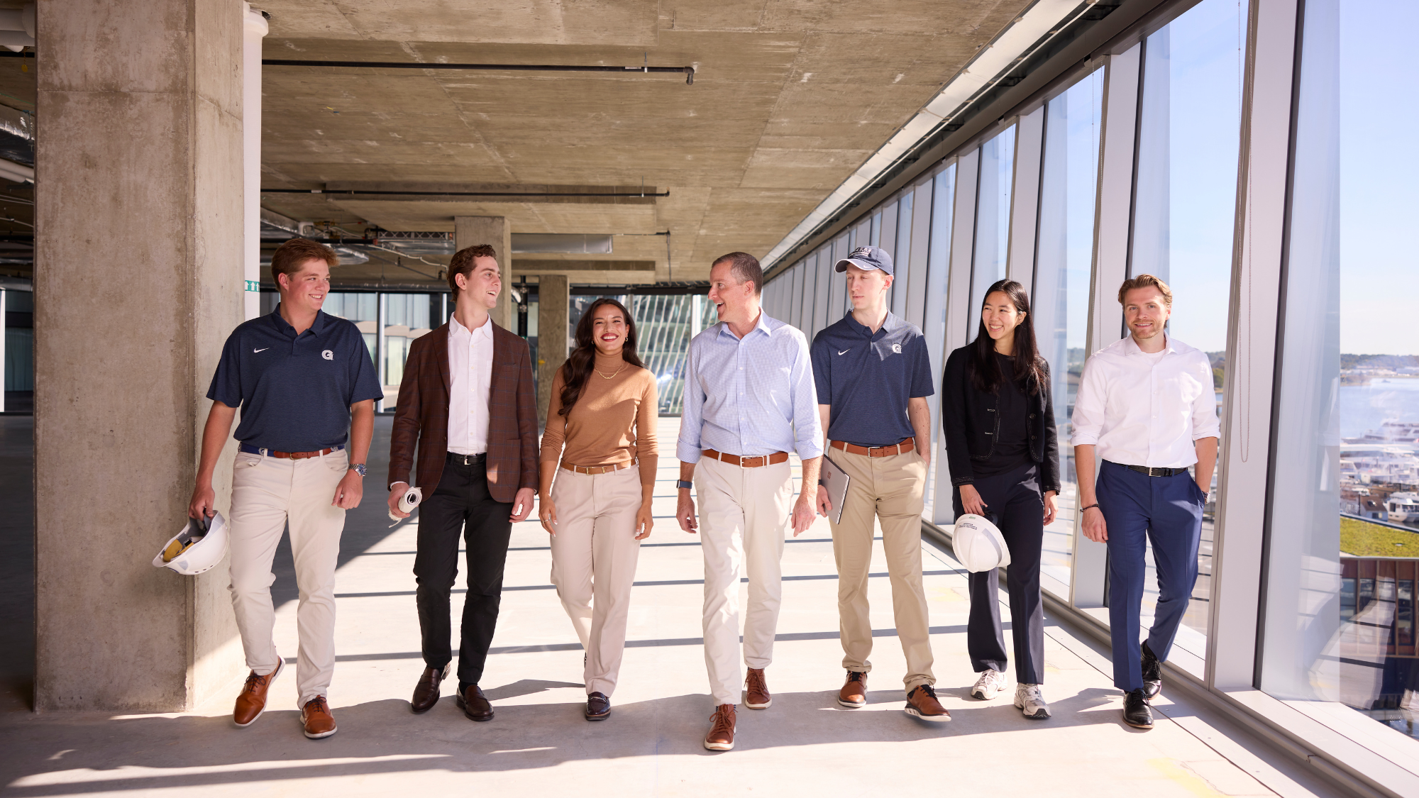 Steers students walking toward the camera in a building in Washington, D.C.