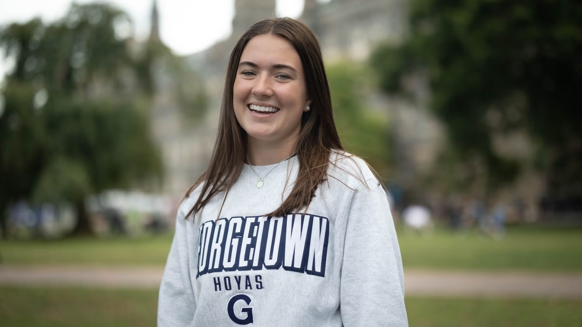Sarah Brannigan (B'28) in front of Healy Hall