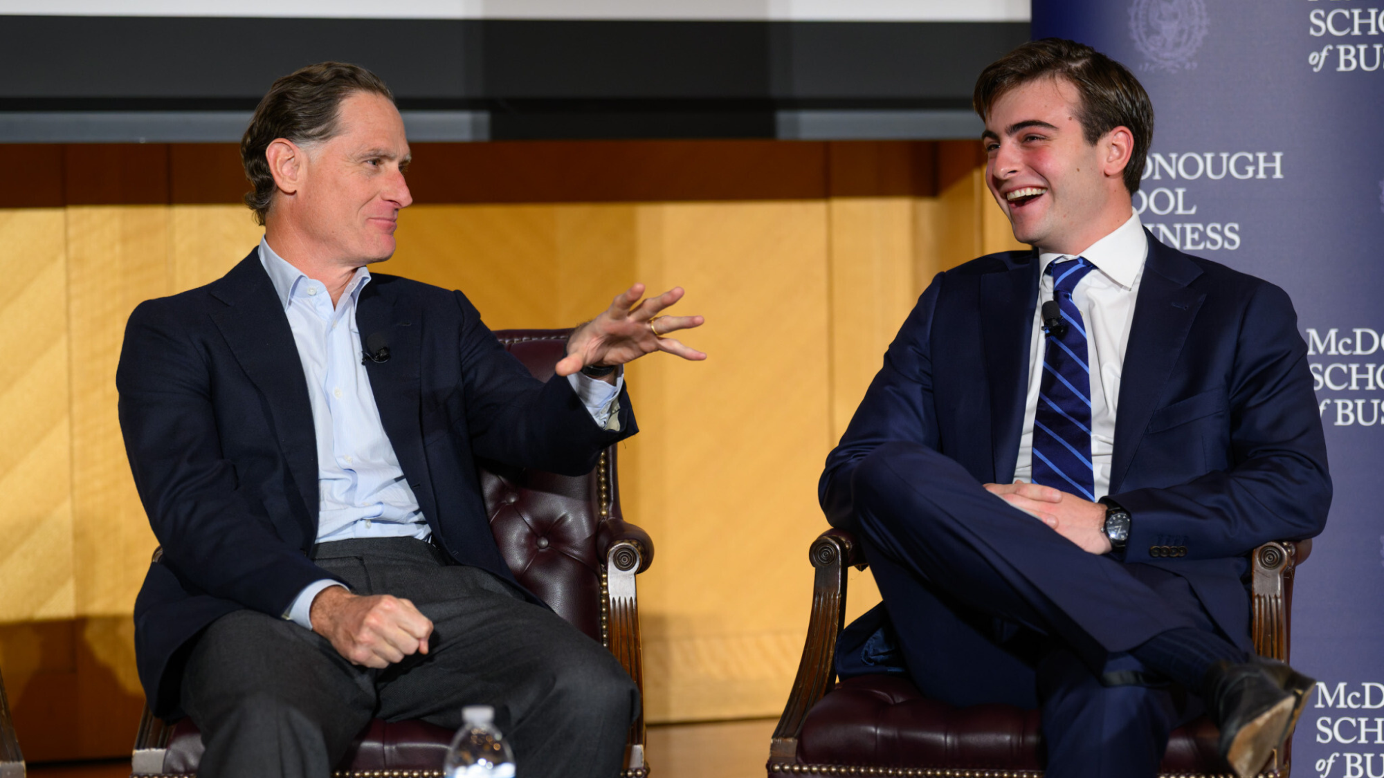 Joe Baratta (left) and Nick Errico (right) interact on stage at Georgetown University