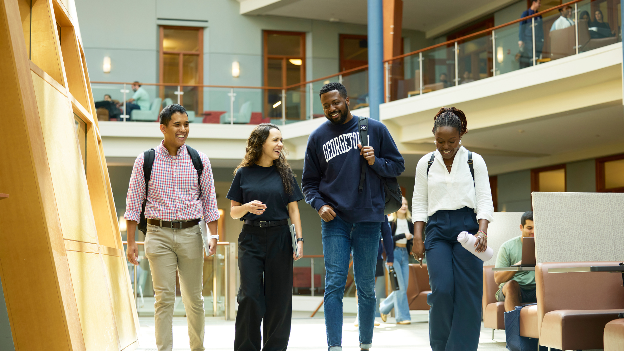 Georgetown MBA students walk the halls in the Hariri Building on campus in Washington, D.C.