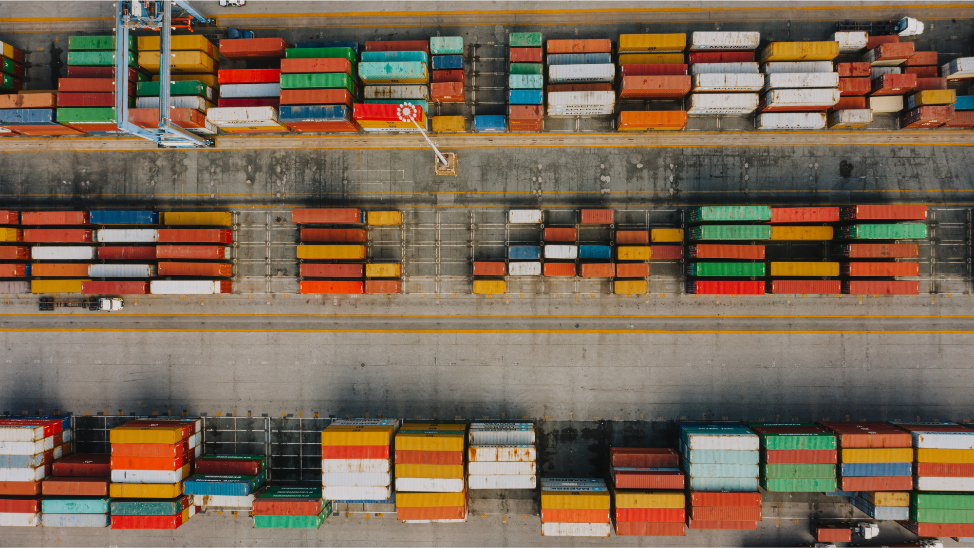 Ariel image of shipping containers on loading doc.