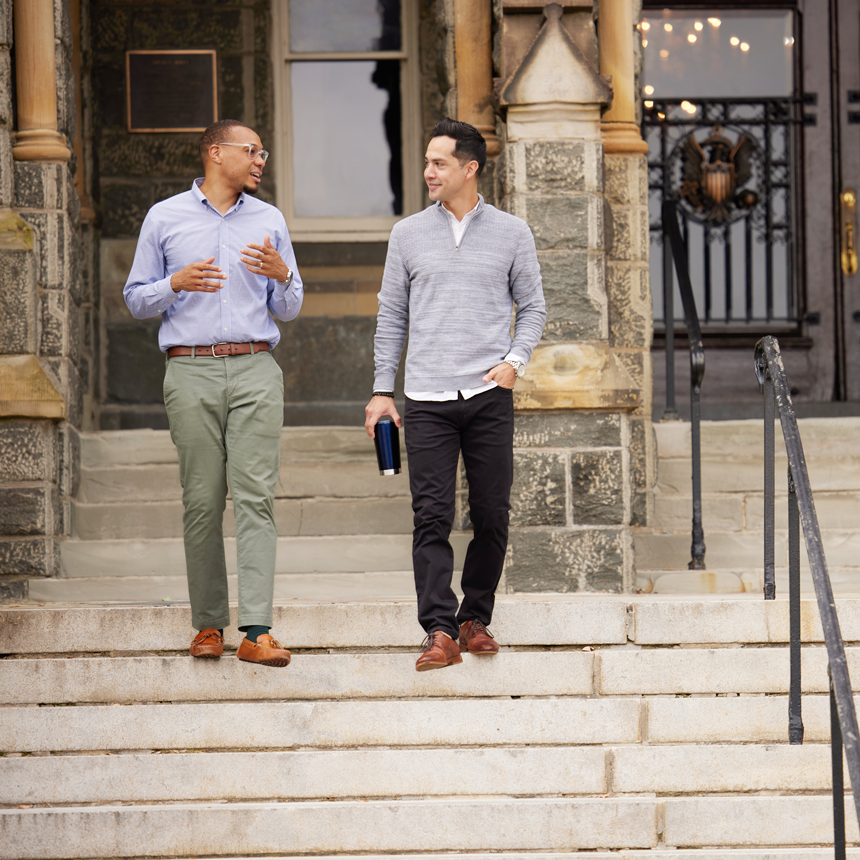 Students walking down the steps of Healy Hall at Georgetown University