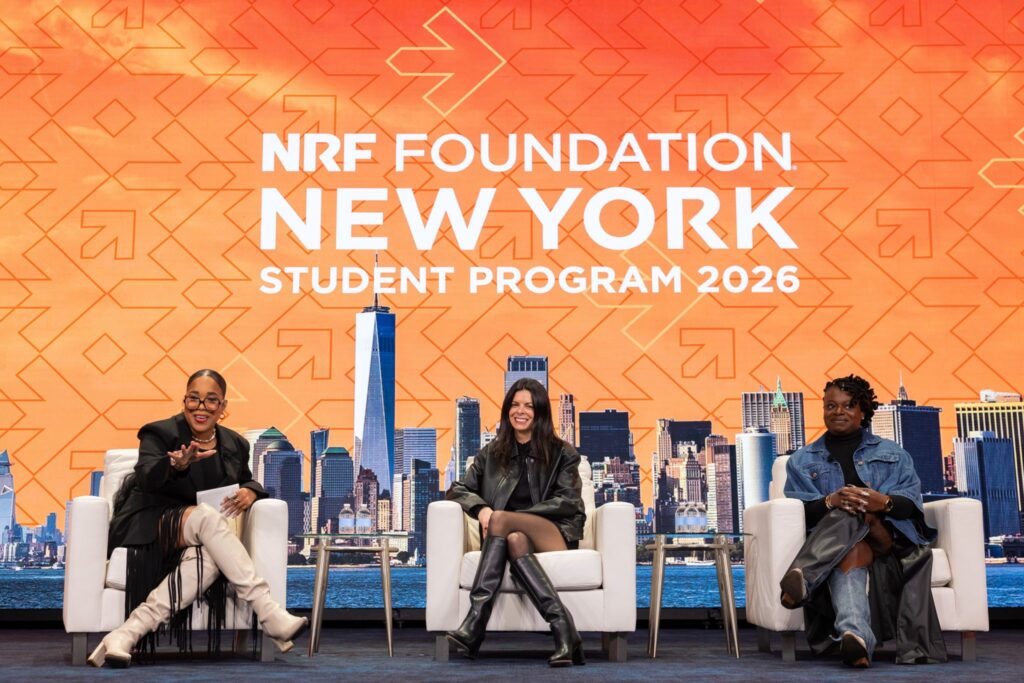 Three panelists on stag during the Young Professionals panel at NRF Foundation Student Program 2026