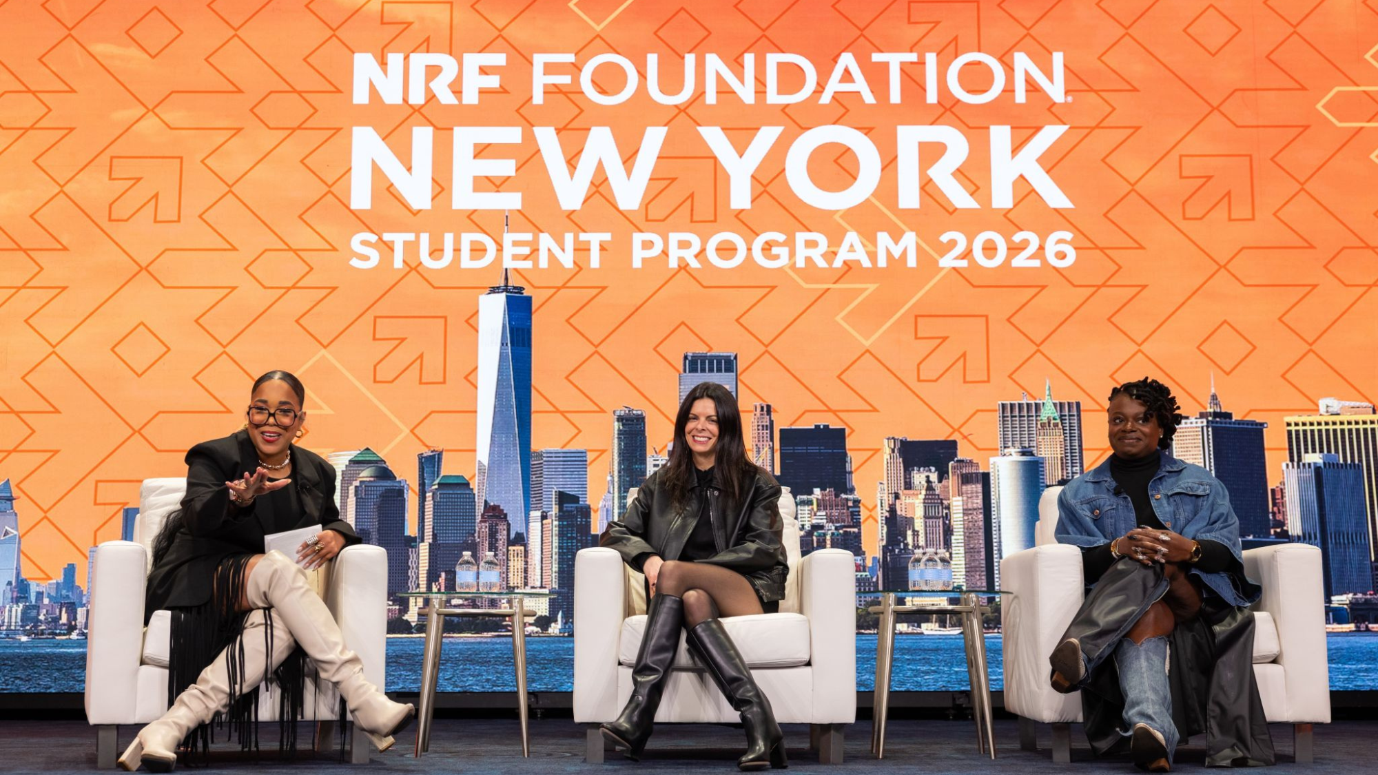 Three panelists on stage during the Young Professionals panel at NRF Foundation Student Program 2026