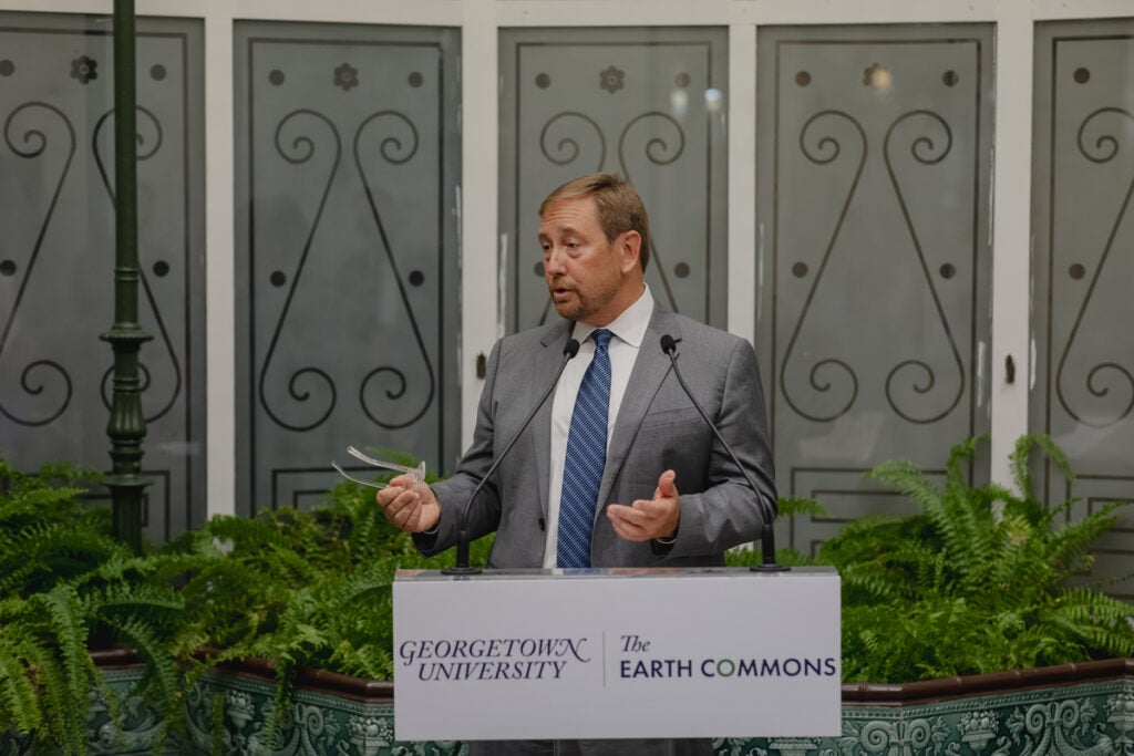 Peter speaking to a room