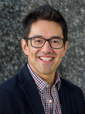 Official headshot of Luis Maes, executive director of the Sports Business Program at McDonough