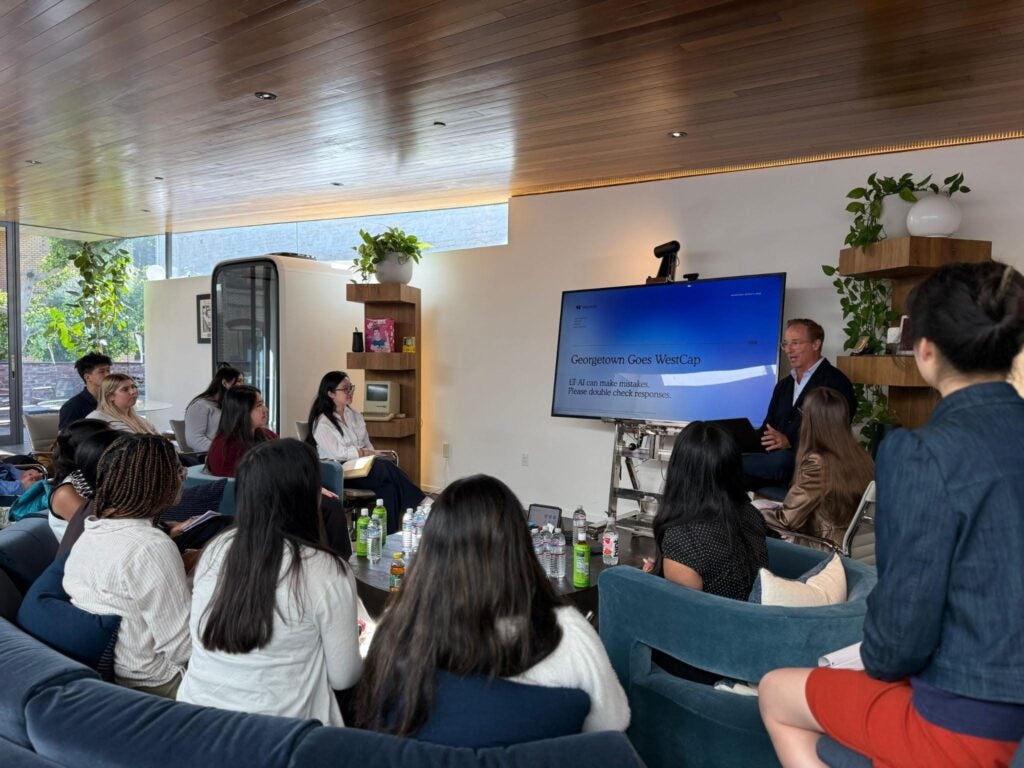 Laurence Tosi (MBA’94), CEO of Westcap, speaking with Georgetown McDonough students on the AI Trek