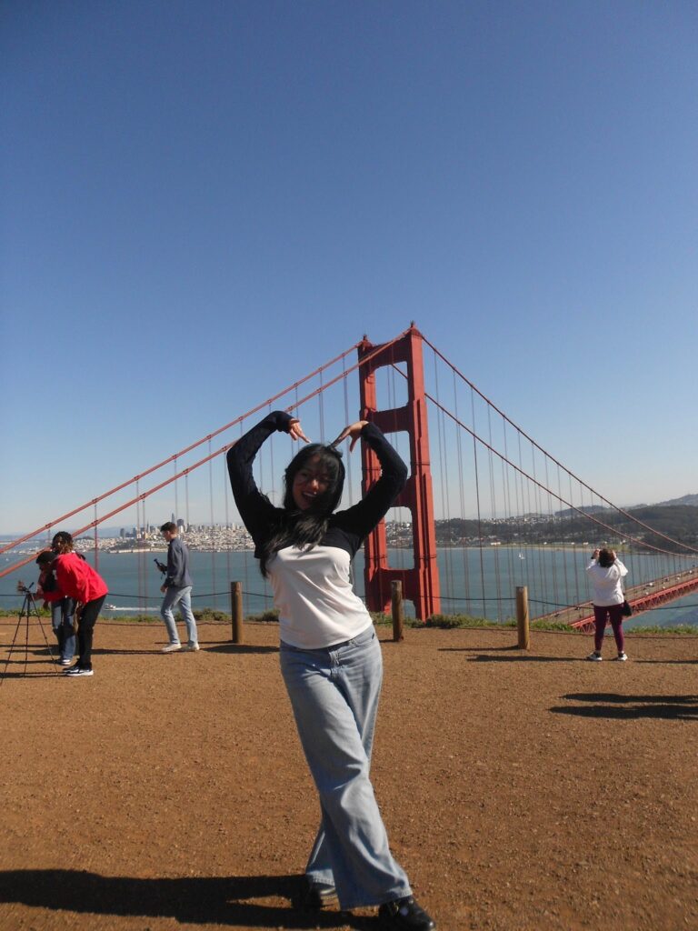Myiesha Permana (B’28) on the AI Career Trek to the Bay Area, pictured here at the Golden Gate Bridge