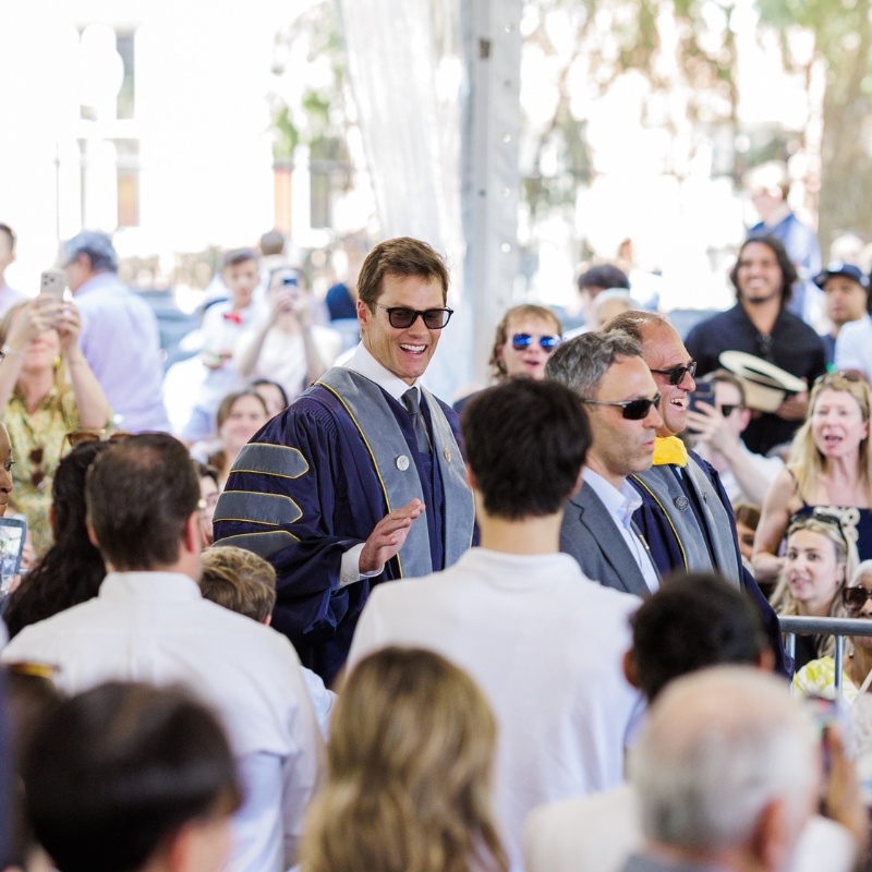 Tom Brady greets the Class of 2026 during commencement exercises.