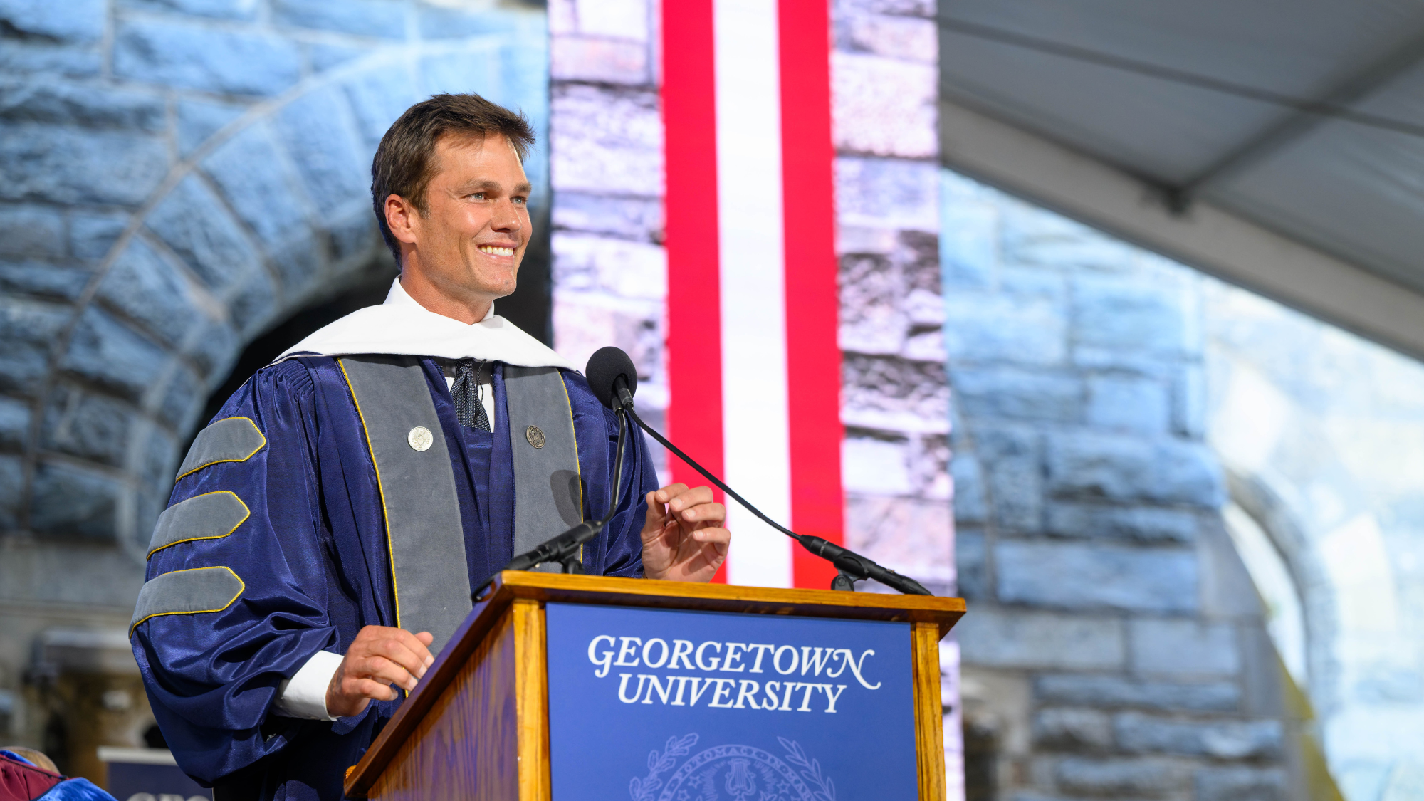 Tom Brady, commencement speaker for the Class of 2026, addresses the graduates
