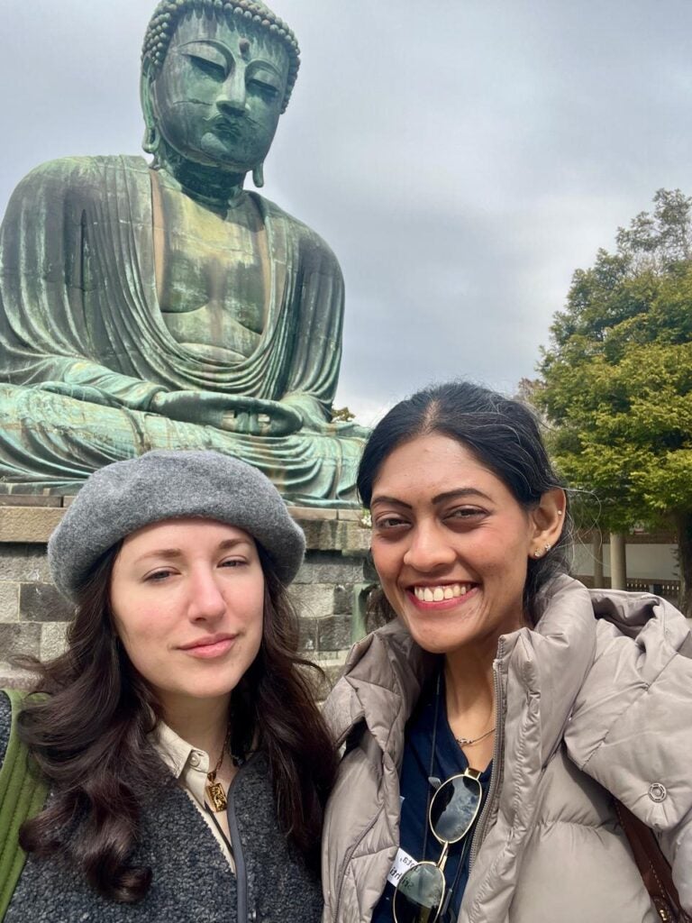 MBA students in front of The Great Buddha of Kamakura (Kamakura Daibutsu).