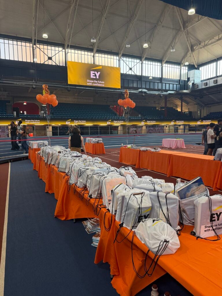 EY intern volunteer event where Pellecer Aguilar built over 1,000 literacy kits for children in K-8th grade.
