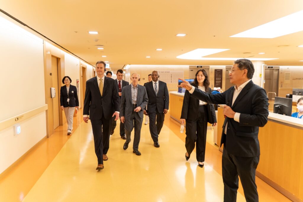 John Shorter and the Executive MBA cohort at Georgetown receiving a tour of the Sun Medical Center facility. 